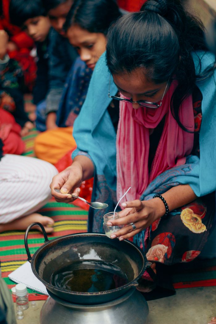 gallery-2 Young girls in Dhaka learn eco-friendly candle making through hands-on training.